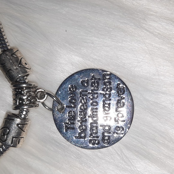 None Jewelry - Grandmother's love silvertone charm bracelet adjustable